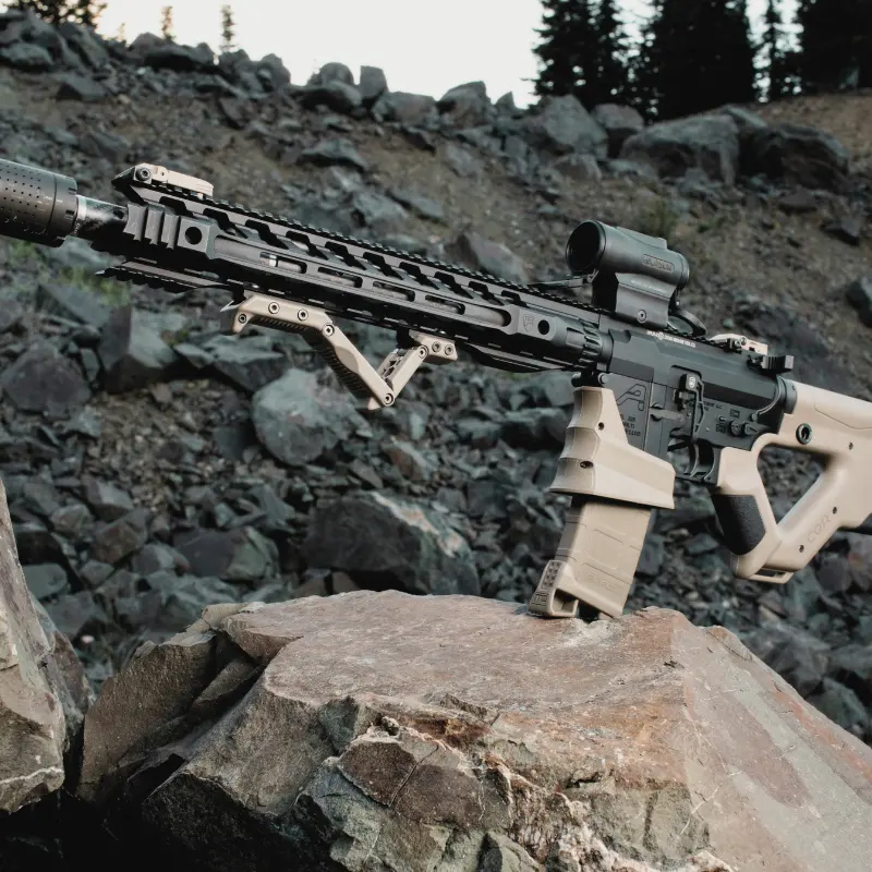 Hera HFGA (Adjustable) TAN 8 AR-15 rifle equipped with Hera Arms HFGA Adjustable Fore Grip and CQR Gen 1.0 Buttstock, both in Flat Dark Earth, for improved control and stability.