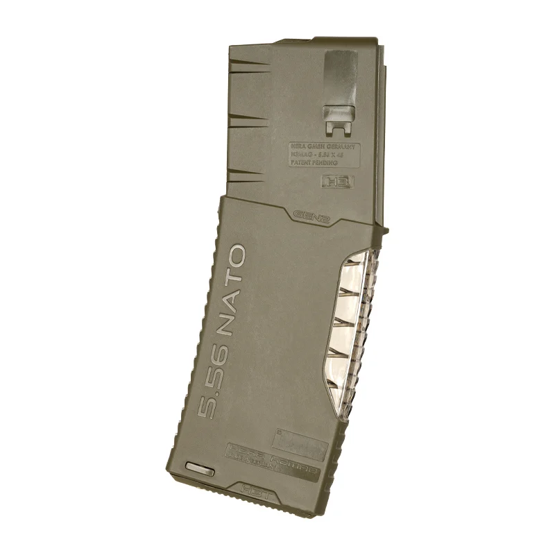 H3MAG-T GREEN 6 Flat lay view of an H3MAG-T AR 30 round magazine in olive drab with a transparent spine.