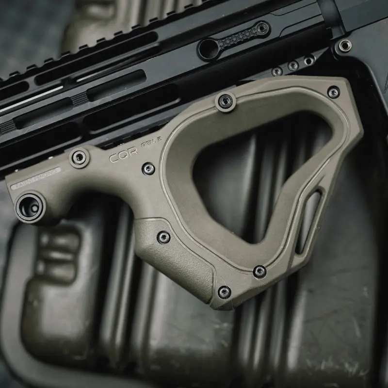 CQR GEN 2.0 Front Grip TAN 8 Close-up of Hera Arms CQR Gen 2.0 OD Green front grip mounted on an AR-15, showcasing ergonomic design and integrated QD sling swivel mount.
