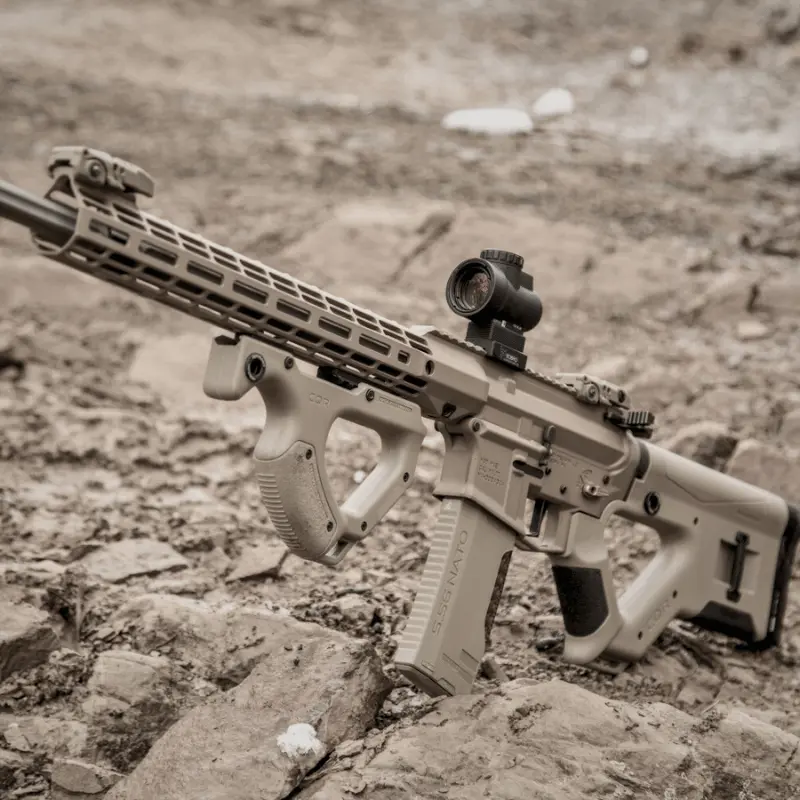 CQR GEN 1.0 (CA) Buttstock TAN 8 AR-15 with Hera Arms CQR Gen 1.0 Buttstock and Front Grip in Flat Dark Earth on desert terrain.